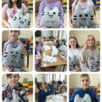 Uczniowie z maskotkami , po zajęciach krawieckich.